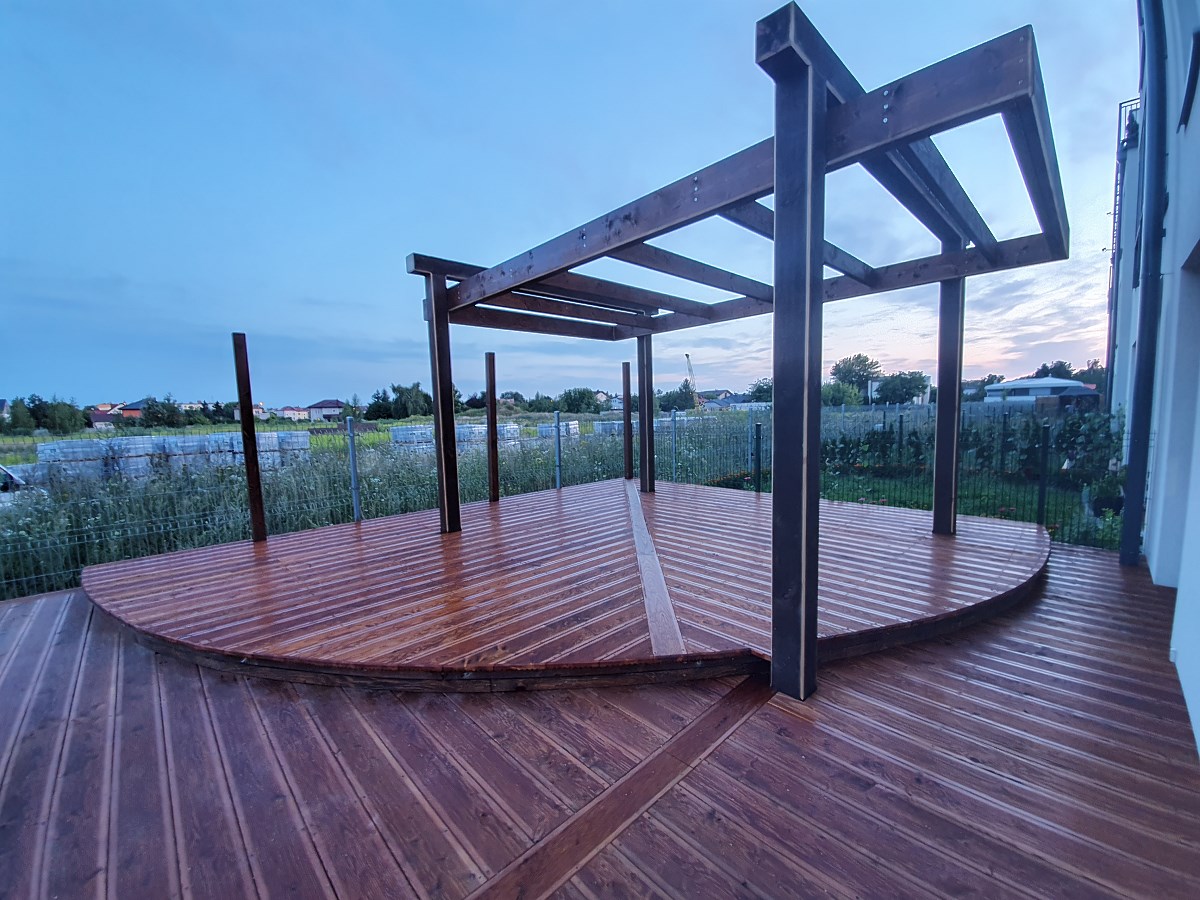 Duchnice/ wooden terrace made of larch wood and pergola”