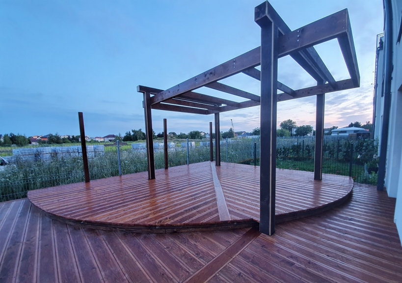 Duchnice/ wooden terrace made of larch wood and pergola”